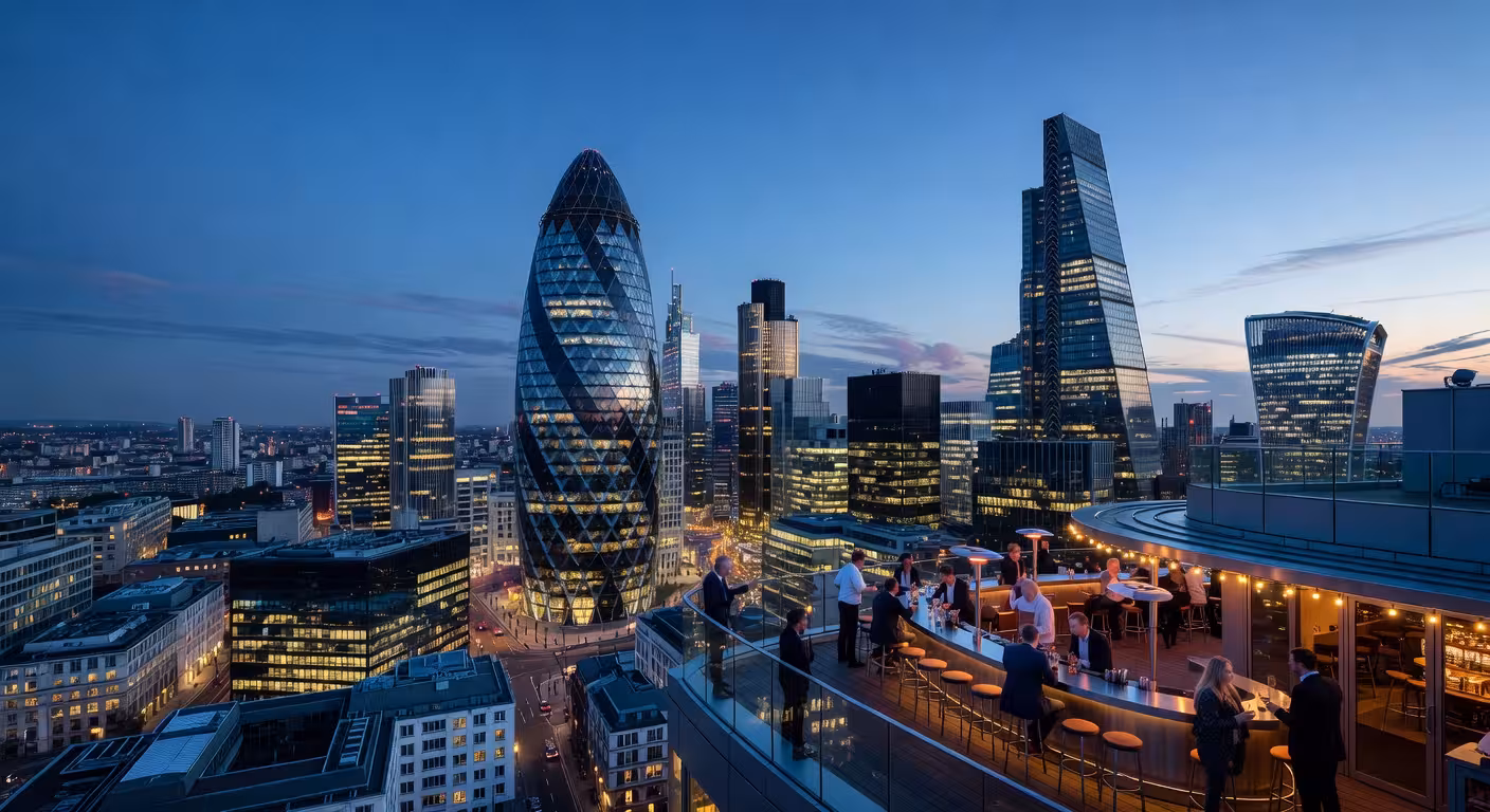 Aerial perspective of London City financial district from a high-rise rooftop bar, Gherkin and Heron Tower visible