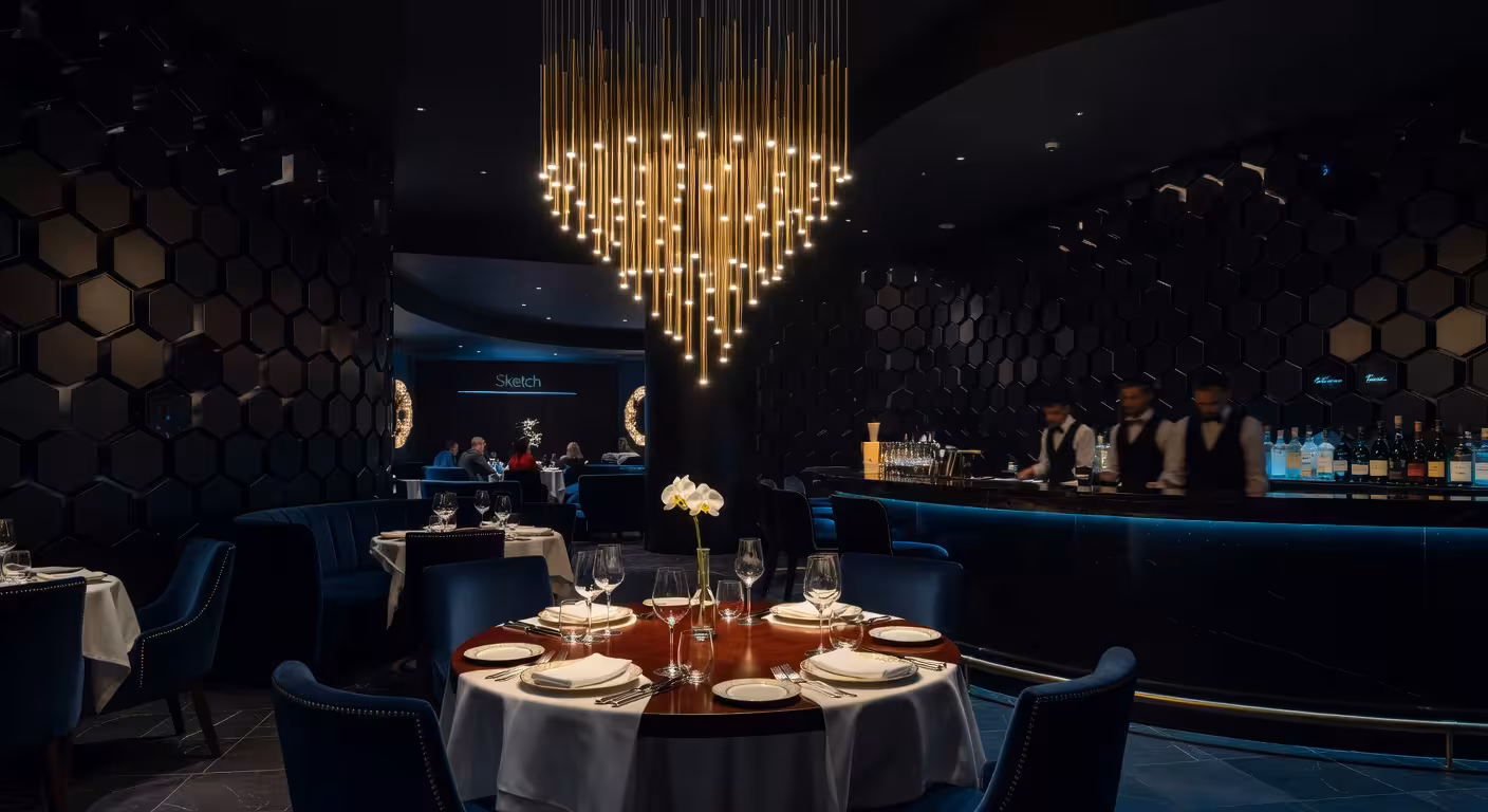 Sophisticated dinner setting at upscale London restaurant, Hakkasan or Sketch style interior, ambient lighting